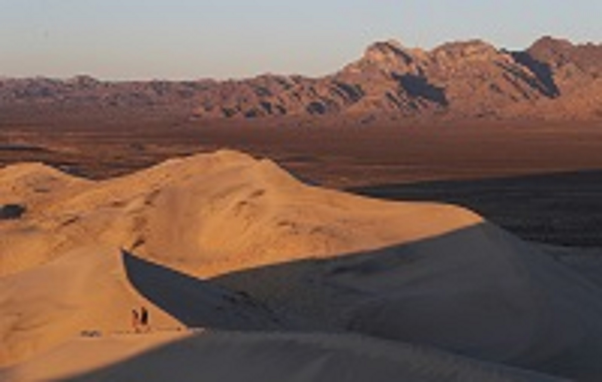 People hike on the Kelso Dunes in the Mojave National Preserve, located in the Mojave desert, on September 21, 2019 near Kelso, California. (AFP)