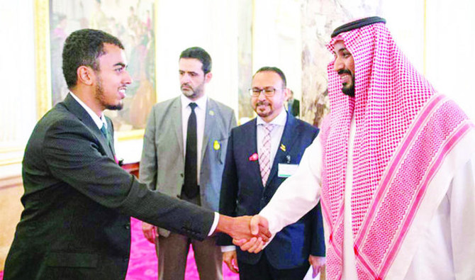 This file photo shows Crown Prince Mohammed bin Salman receives at his residence in Tokyo a group of Saudi students studying in Japanese universities. (SPA)