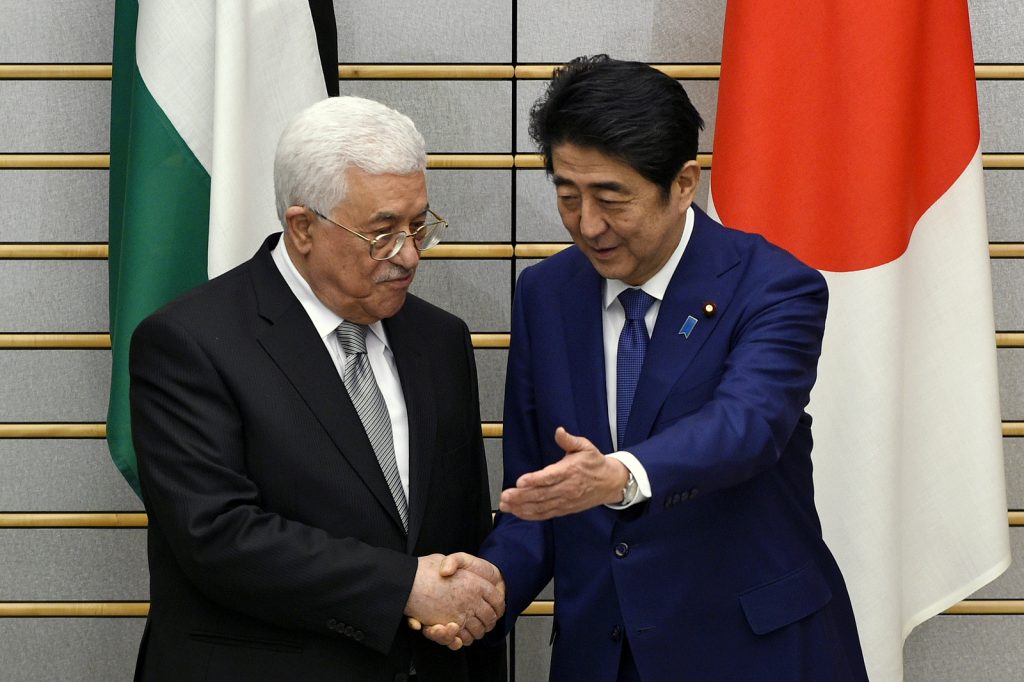 Mahmoud Abbas and Shinzo Abe. (AP Photo)