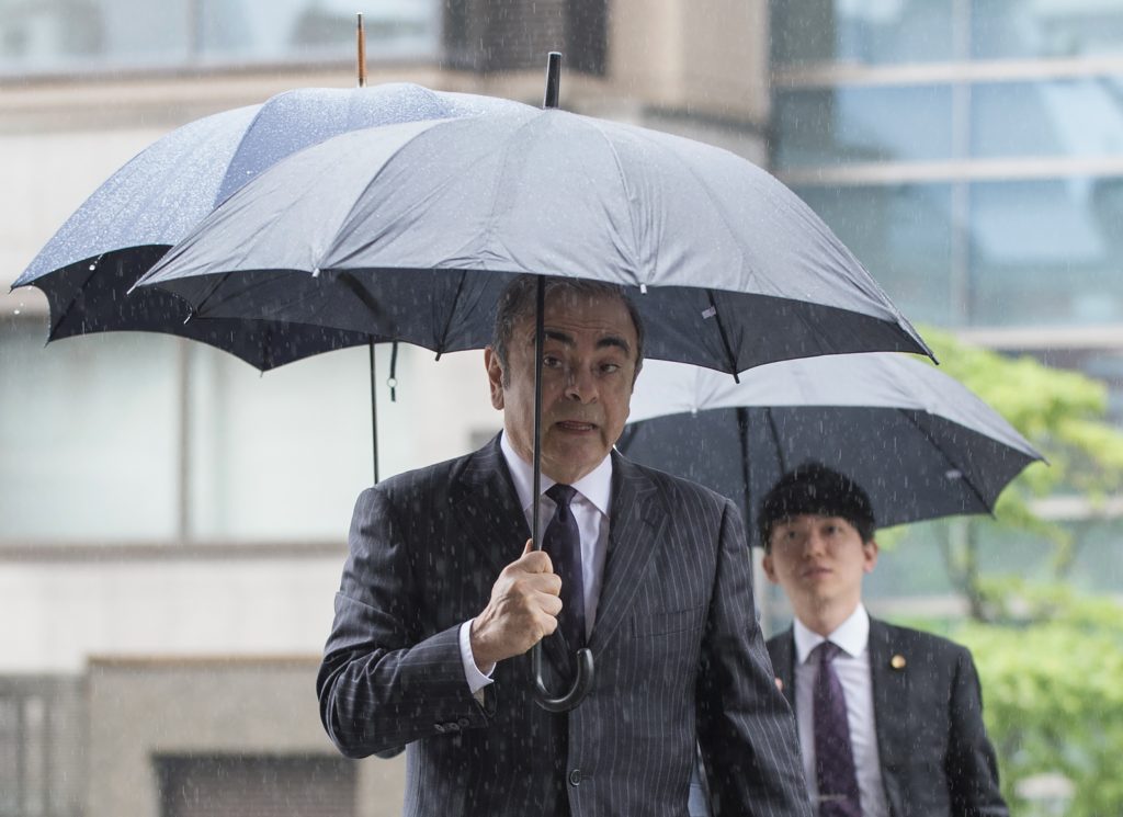 Former Nissan Motor Chairman Carlos Ghosn arrives for a pre-trial hearing at the Tokyo District Court in Tokyo on June 24, 2019. (AFP)