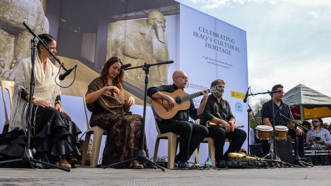 Members of a Spanish flamenco music group perform during a ceremony for the unveiling of replicas of 