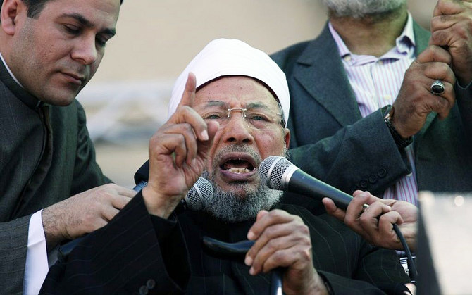  Sheikh Yusuf Al-Qaradawi speaking to a crowd in Cairo's Tahrir Square on Feb. 2, 2014 (AP file photo)