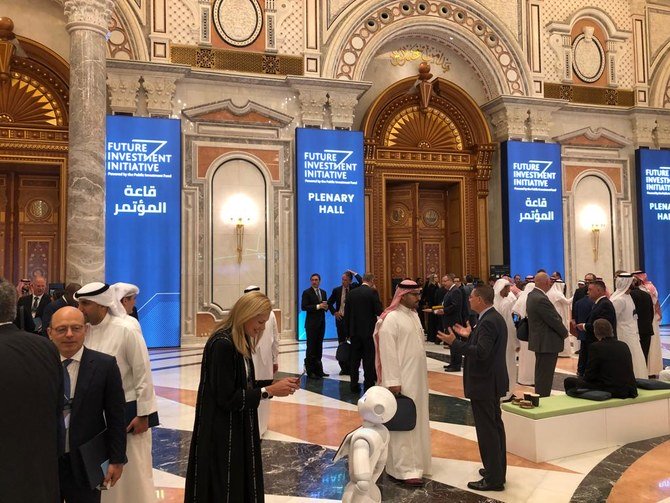 Participants arrive at Riyadh’s Ritz Carlton hotel for the three-day Future Investment Initiative conference. (AN/Ziyad Alarfaj)