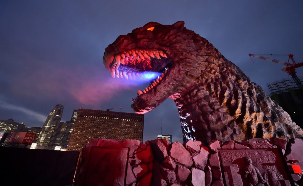 A life-size Godzilla head is displayed on a balcony of Hotel Gracery Shinjuku during the unveiling ceremony at Kabukicho shopping district in Tokyo on April 9, 2015. (File photo/AFP)
