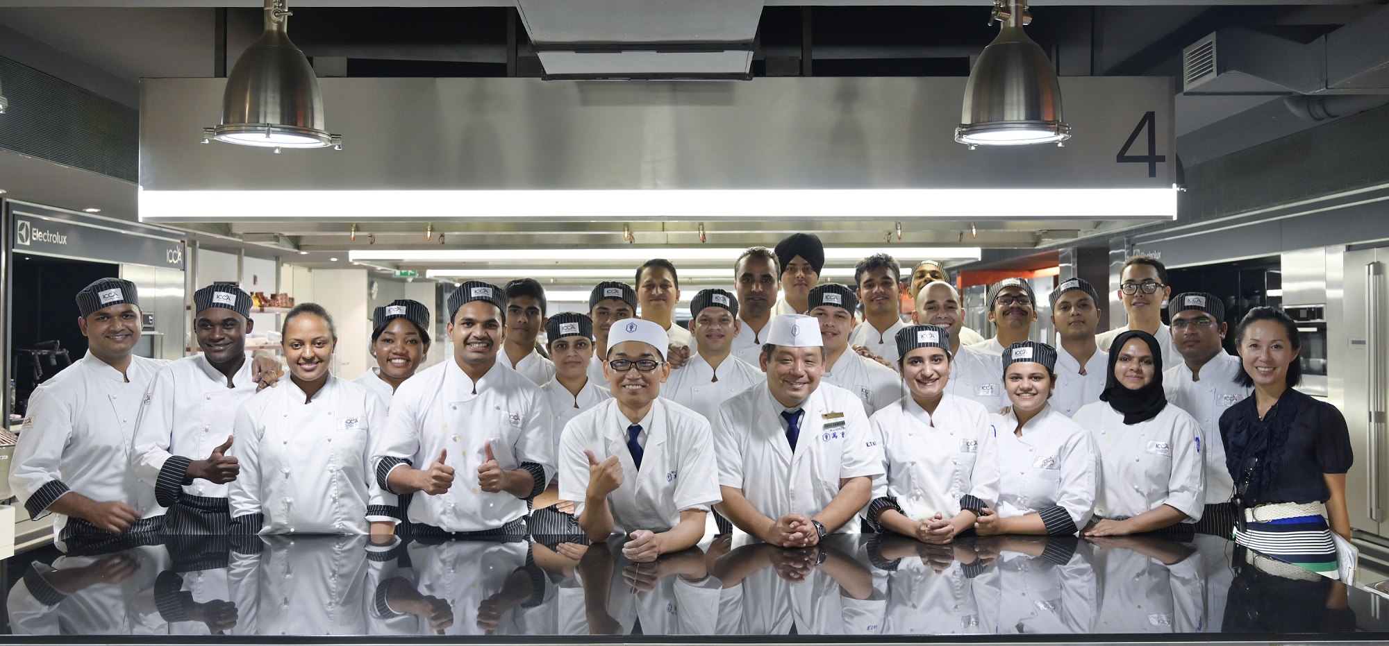 Chef Tamura with students from the International Centre for Culinary Arts. -- Picture courtesy ICCA