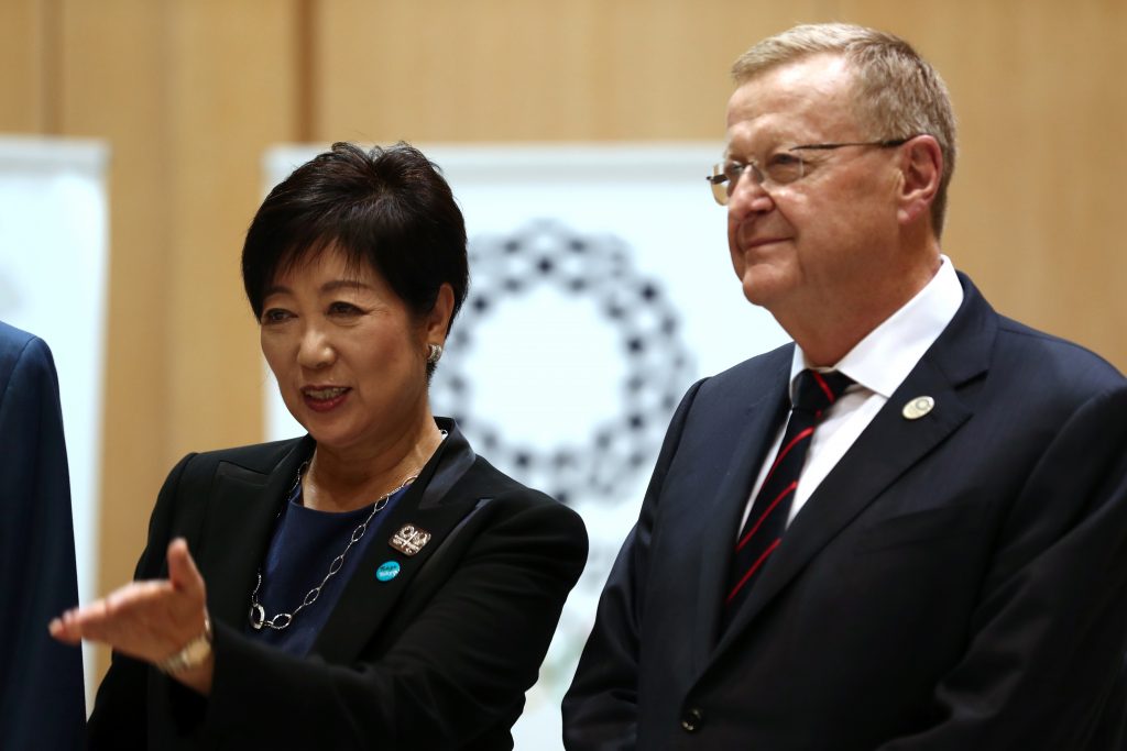 Tokyo Governor Yuriko Koike (left) gestures as chairman of the Tokyo 2020 Olympic Games coordination committee, John Coates, looks on in Tokyo. (AFP)