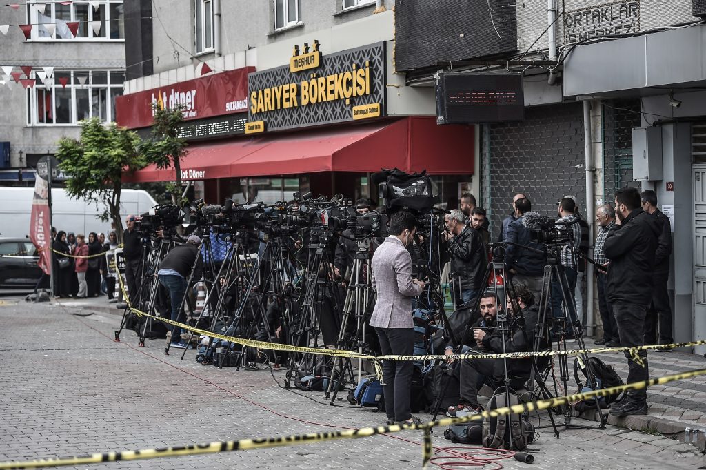 Media and journalists wait next to the cordoned off underground car park, in the Sultangazi district of Istanbul, on October 23, 2018. (File photo: AFP)