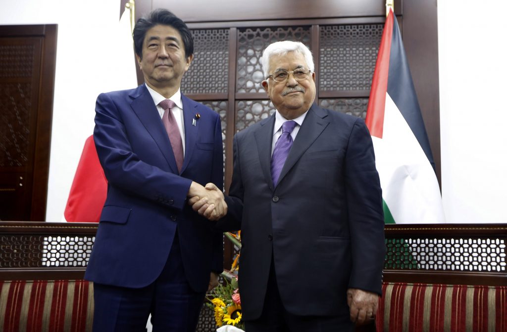 Japanese Prime Minister Shinzo Abe meets with Palestinian president Mahmud Abbas in the West Bank city of Ramallah on May 1, 2018. (AFP)