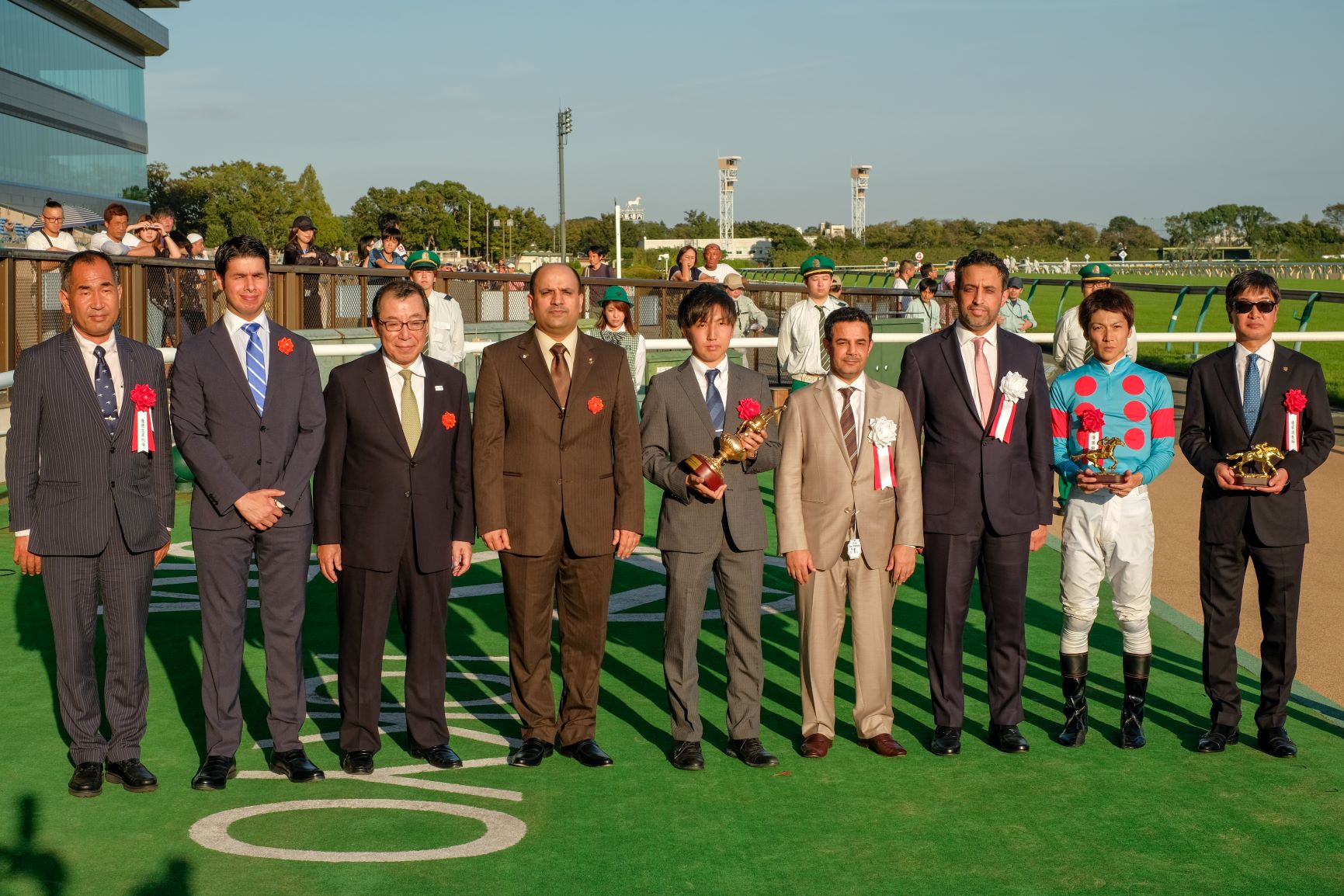  Equestrian Club General Manager Adel Al-Mazroua awards the Saudi cup to Al-Ishibashi Shuo, jockey of the winning horse Sirus. (Photo/Supplied)