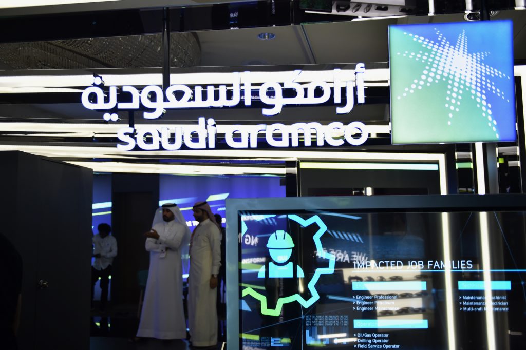 Visitors stop at the Aramco exhibition section at the Misk Global Forum on innovation and technology held in the Saudi capital Riyadh on November 13, 2019. (AFP)