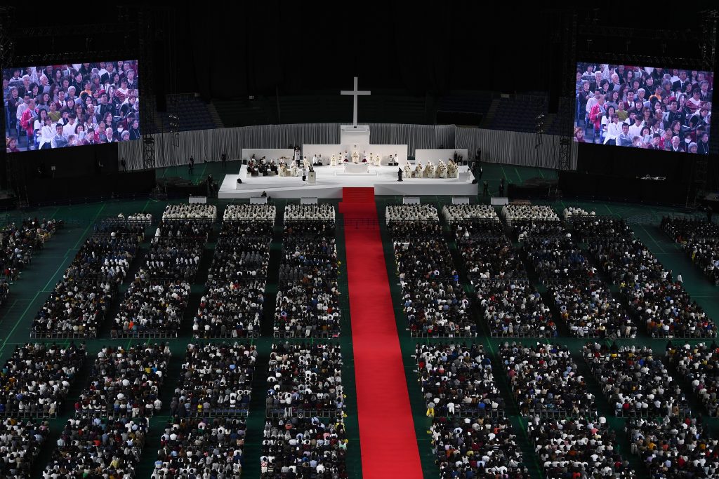 Pope Francis waves upon his arrival for a holy mass at the Tokyo Dome stadium in Tokyo on November 25, 2019. (AFP)