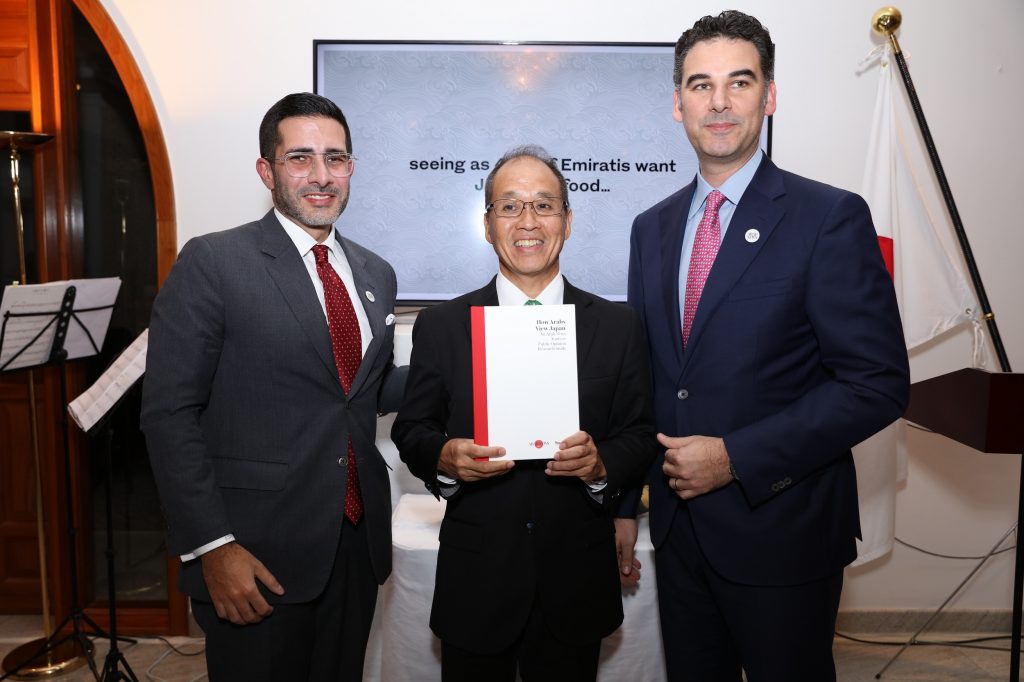 Dr. Akima Umezawa, center, the Consul-General of Japan to Dubai, receives a hardcopy of the Arab News-YouGov poll from Editor-in-Chief Faisal J. Abbas, left, and Ali Itani, Regional Head of Arab News Japan.