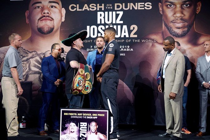 Heavyweight Boxing Champion Andy Ruiz Jr. (L) stands with contender Anthony Joshua at a press conference for Ruiz vs. Joshua 2 at Capitale in New York on September 5, 2019. (AFP)