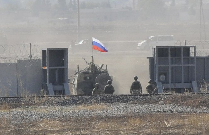 A Russian army vehicle enters Syria as it begins its joint patrol with Turkish forces on Tuesday, Nov. 5, 2019. (AP)