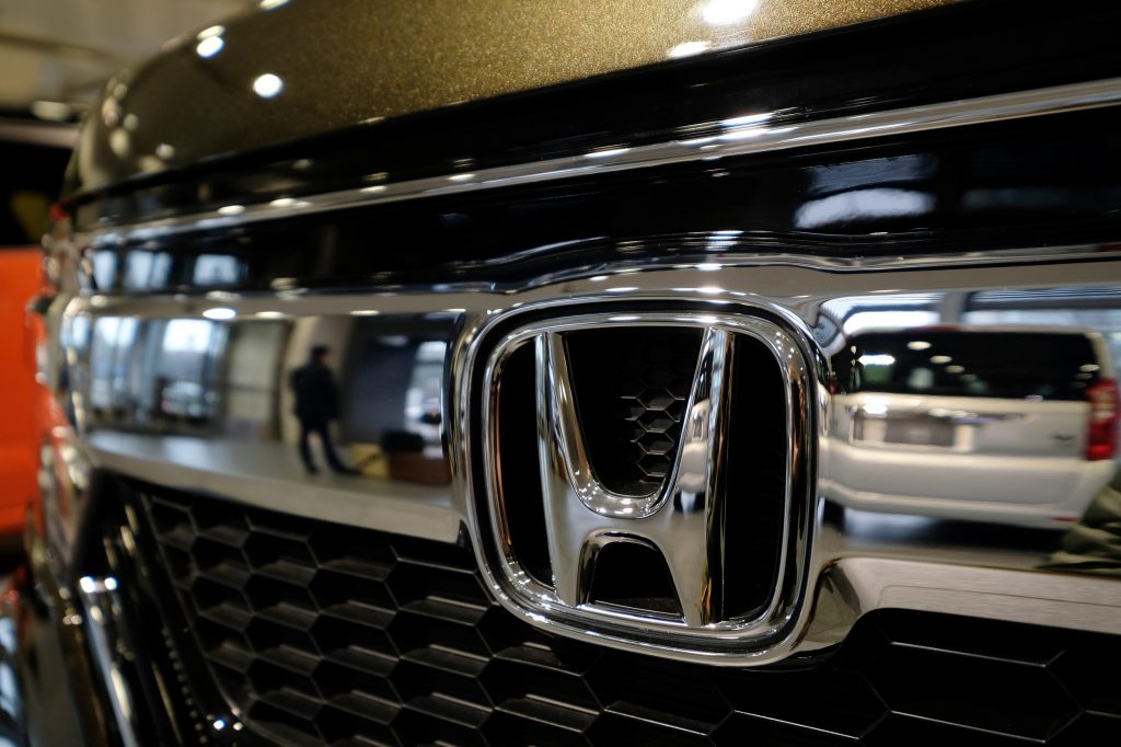 The emblem of Japan’s Honda Motor Co. is displayed on one of the company’s latest cars at a showroom in Tokyo on February 2, 2018. (AFP)