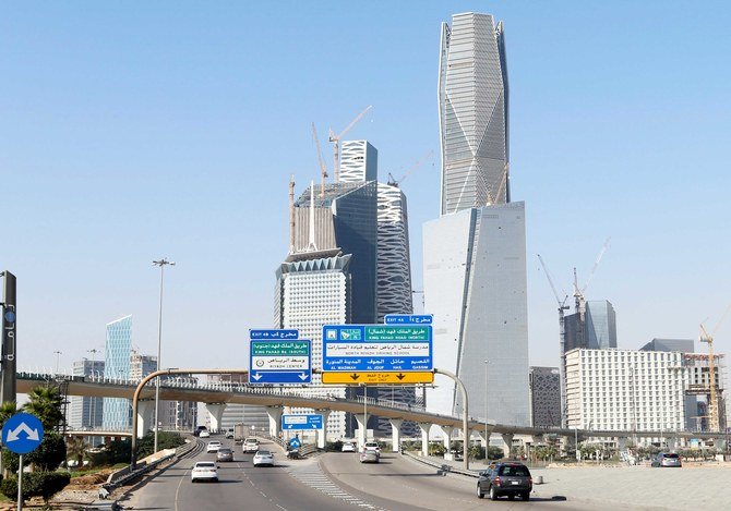 Cars drive past the King Abdullah Financial District in Riyadh, Saudi Arabia December 18, 2018. (Reuters)