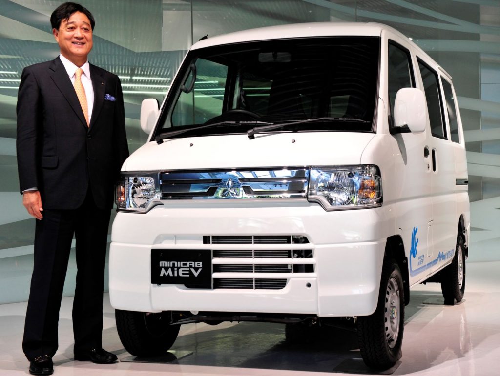 Mitsubishi Motors president Osamu Masuko introduces the new Minicab MiEV electric van at the company’s headuqrters in Tokyo on November 24, 2011. (AFP)