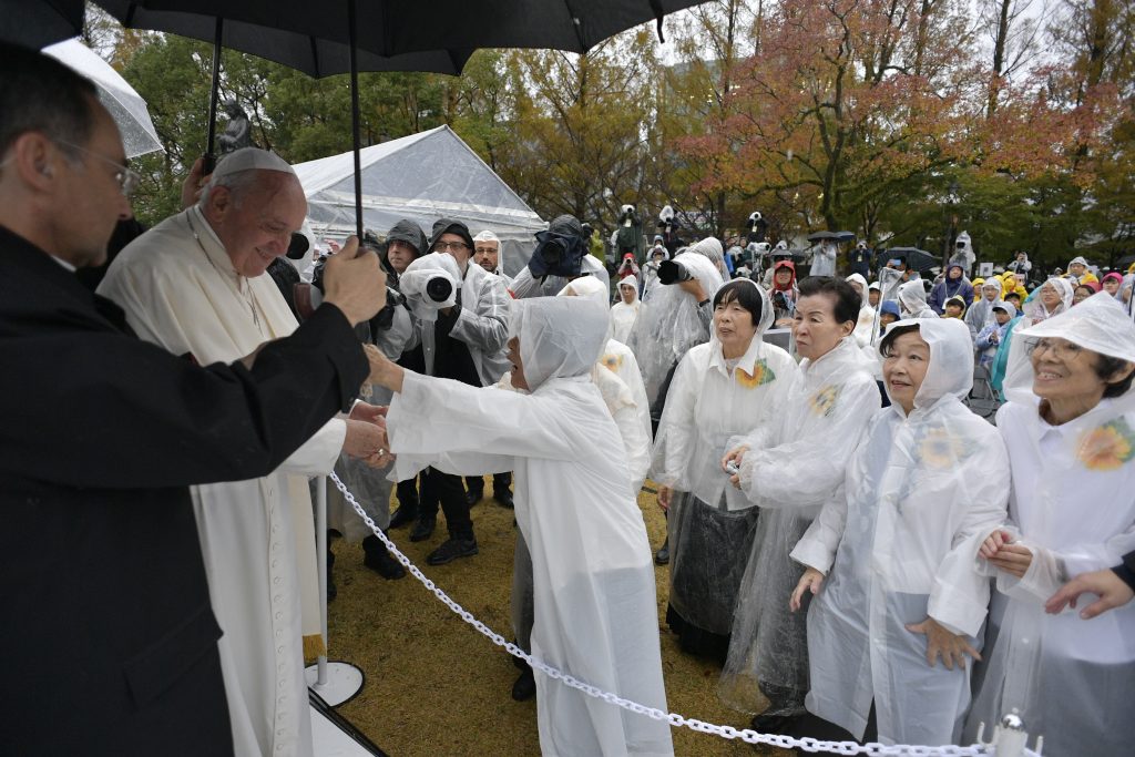 Pope Francis greets well-wishers at the Atomic Bomb Hypocenter in Nagasaki on November 24, 2019. (AFP)