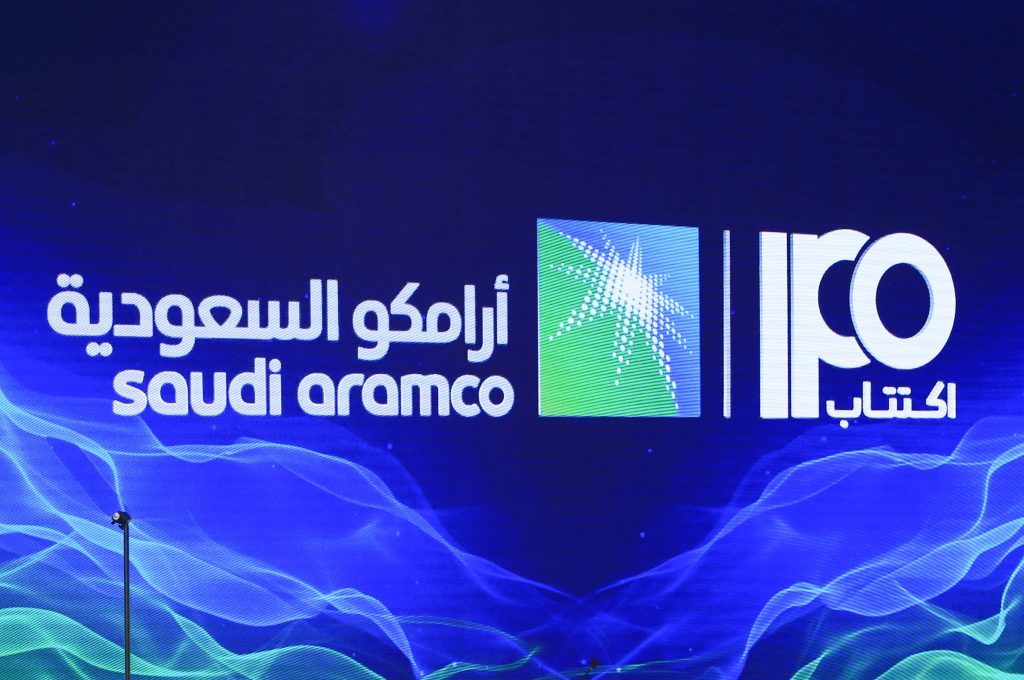 A picture taken on November 3, 2019 shows a sign of Saudi Aramco’s IPO during a press conference by the state company in the eastern Saudi Arabian region of Dhahran. (AFP)