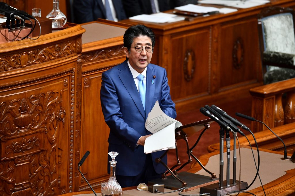 Japan’s Prime Minister Shinzo Abe answers questions during a House of Councilors plenary session at Parliament in Tokyo on November 20, 2019. (AFP)