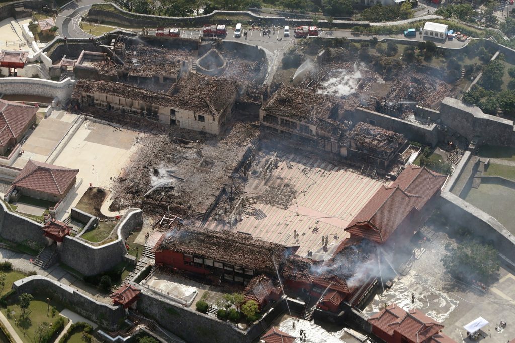 This aerial picture shows Shuri Castle after a fire ripped through the historic site in Naha, Japan's southern Okinawa prefecture on October 31, 2019. (JIJI PRESS / AFP)