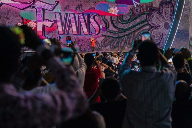 Fans cheer as wrestler Lacey Evans appears on stage. (AN Ziyad Alarfaj)