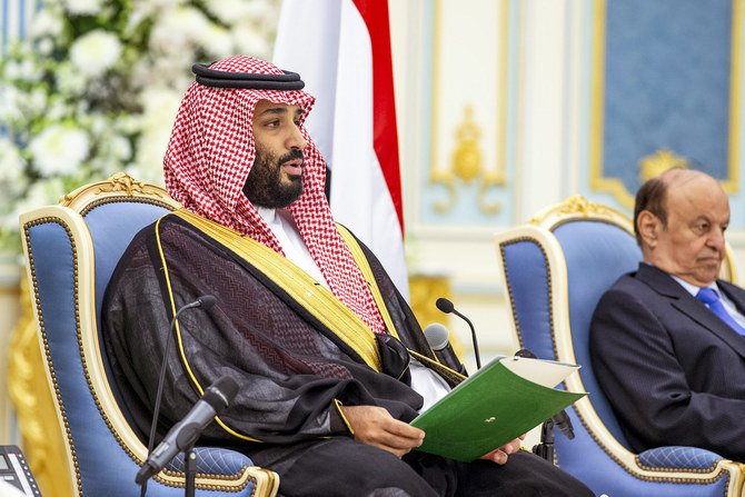Crown Prince Mohammed bin Salman next to Yemen's President Abedrabbo Mansour Hadi attending a peace-signing between the Yemeni government and the southern separatists. (Saudi Royal Palace)
