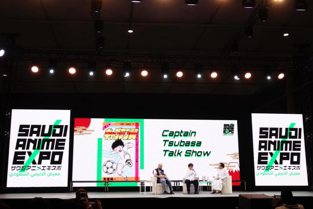 Yoichi Takahashi, creator of “Captain Tsubasa” (centre) addresses the gathering at the Riyadh Season's first Anime Expo. (AN photos by Huda Bashatah)