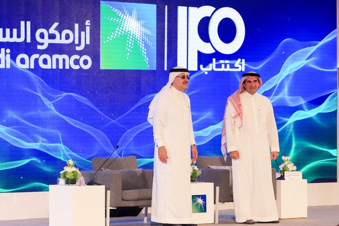 President and CEO of Saudi Aramco Amin Nasser (L) and Aramco's chairman Yasir al-Rumayyan attend a press conference in the eastern Saudi Arabian region of Dhahran on November 3, 2019. (AFP)
