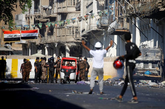 Demonstrators take part in the ongoing anti-government protests in Baghdad, Iraq November 8, 2019. (Reuters)