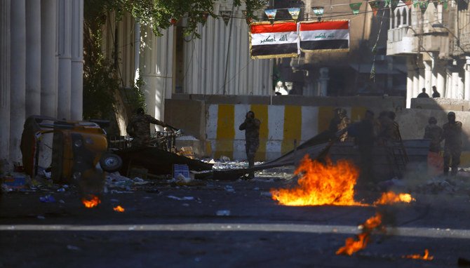 Members of Iraqi security forces are seen during the ongoing anti-government protests in Baghdad, Iraq November 8, 2019. (Reuters)