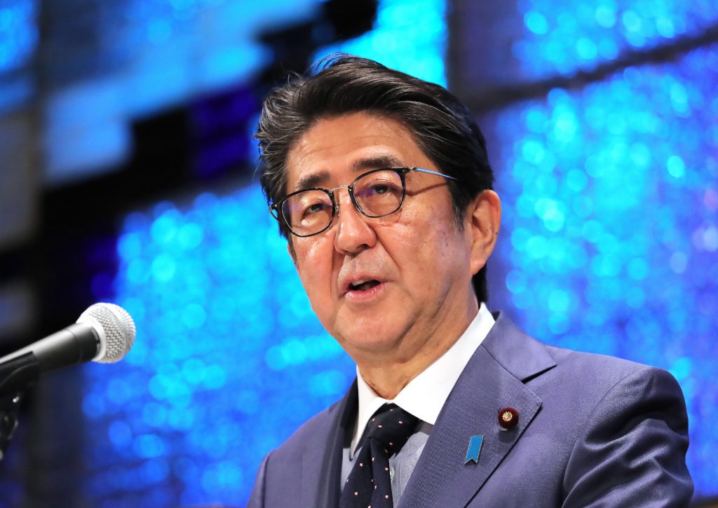 Japan's Prime Minister Shinzo Abe delivers a speech during a lecture in Tokyo on December 13, 2019. (AFP)