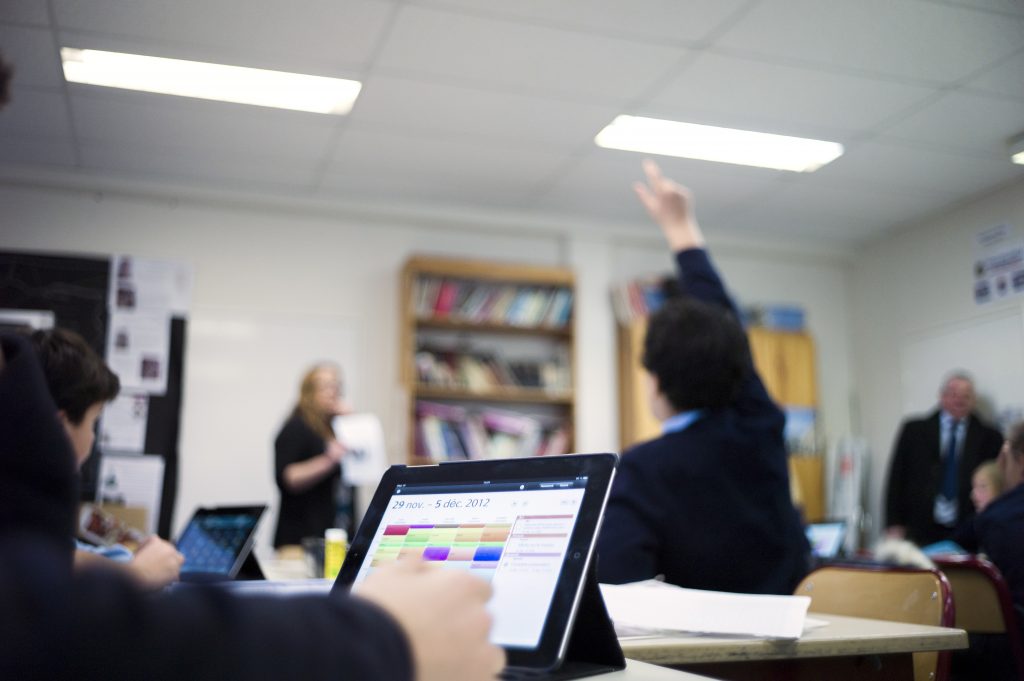 Digital teaching materials, utilizing information and communications technologies and artificial intelligence, are expected to allow students to learn based on their proficiency levels. (AFP)