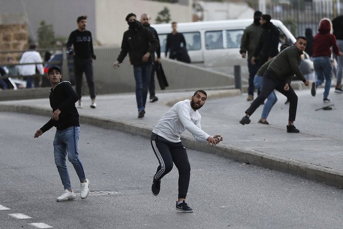 Clashes broke out on Saturday between Lebanese security forces and Hezbollah supporters in downtown Beirut. (AP)