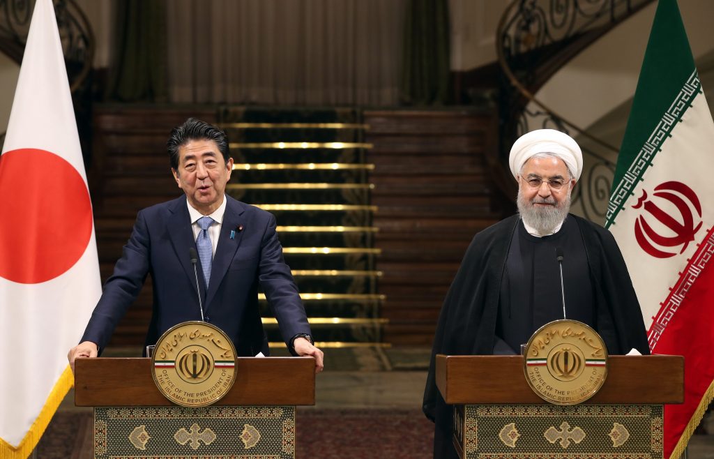 Iranian President Hassan Rouhani (R) and Japanese Prime Minister Shinzo Abe, give a joint press conference at the Saadabad Palace in Tehran on June 12, 2019. (AFP)