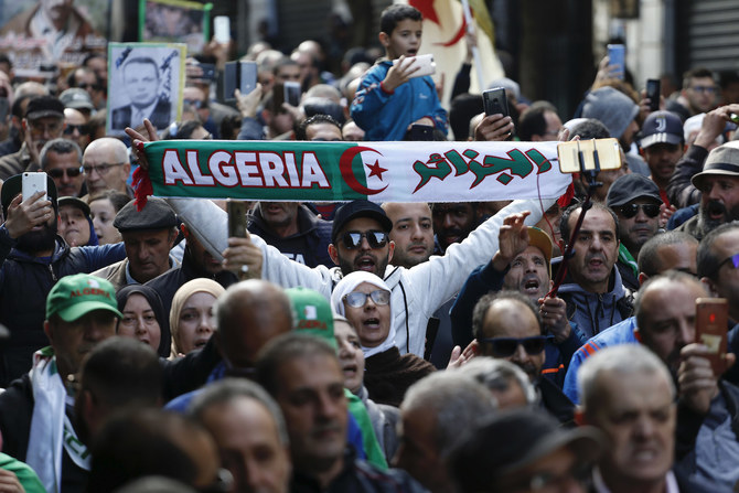 Protesters take to the streets in the capital Algiers to reject the presidential elections and protest against the government, in Algeria, Friday, Dec. 27, 2019. (AP)