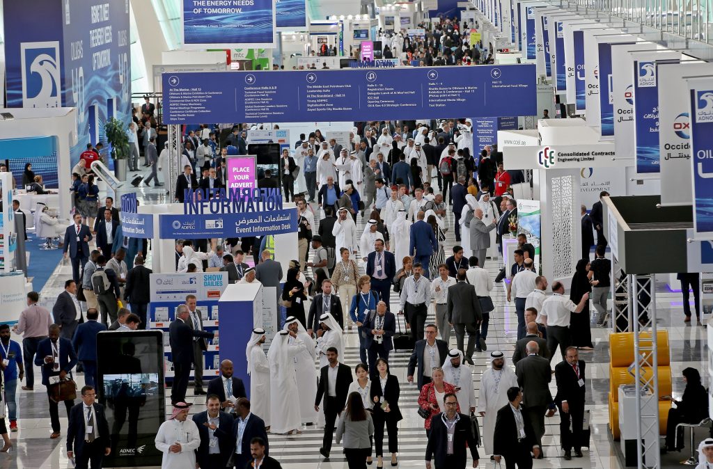 Participants attend the Abu Dhabi International Petroleum Exhibition and Conference in Abu Dhabi on November 11, 2019. (File photo/AFP)