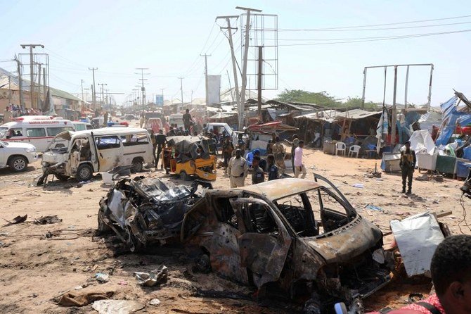 Above, the scene of a car bomb explosion at a checkpoint in Mogadishu. (Reuters)