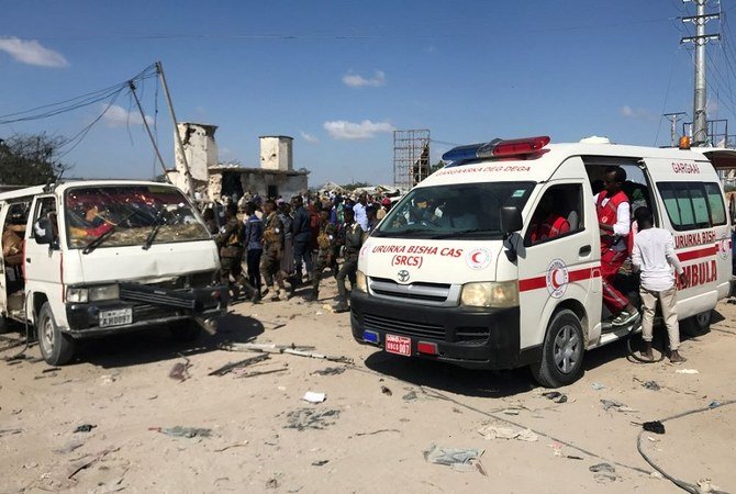 An ambulance leaves from the scene of a car bomb explosion at a checkpoint in Mogadishu, Somalia on Saturday, Dec. 28, 2019. (Reuters)