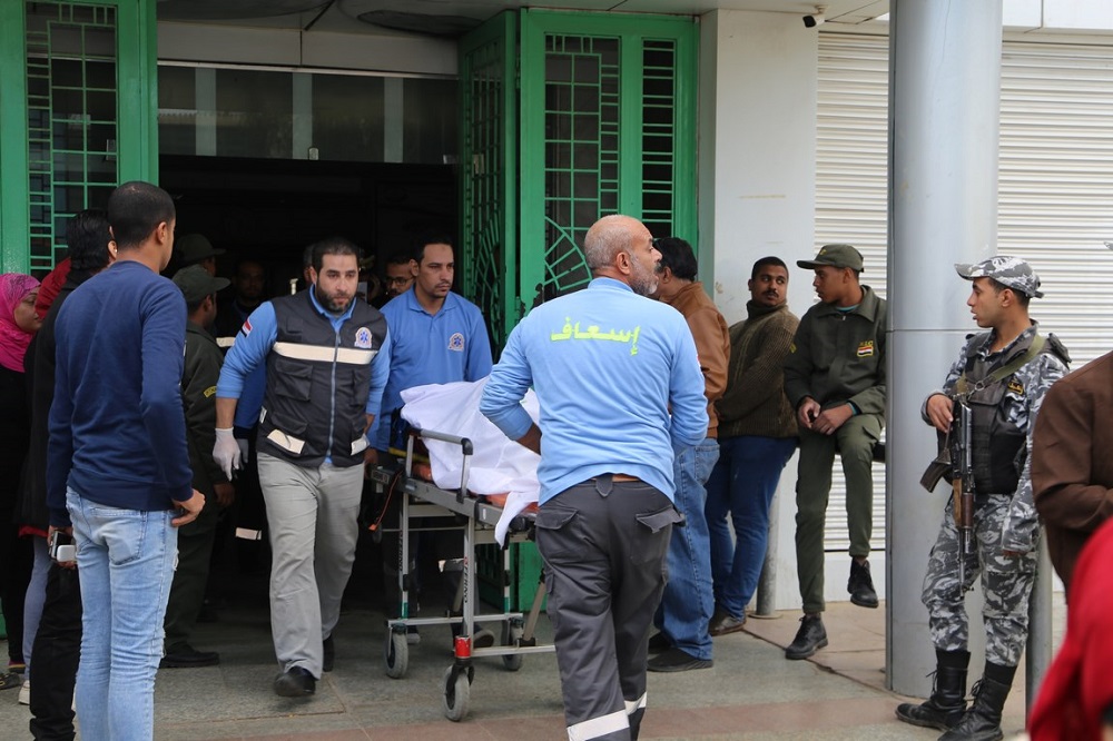A handout picture released by the Suez Governorate Media Office on December 28, 2019 shows paramedics transporting one of the victims who was injured in a bus cash on the road to the Ain Sokhna resort east of the Egyptian capital Cairo, upon arrival at Suez General Hospital. (AFP)
