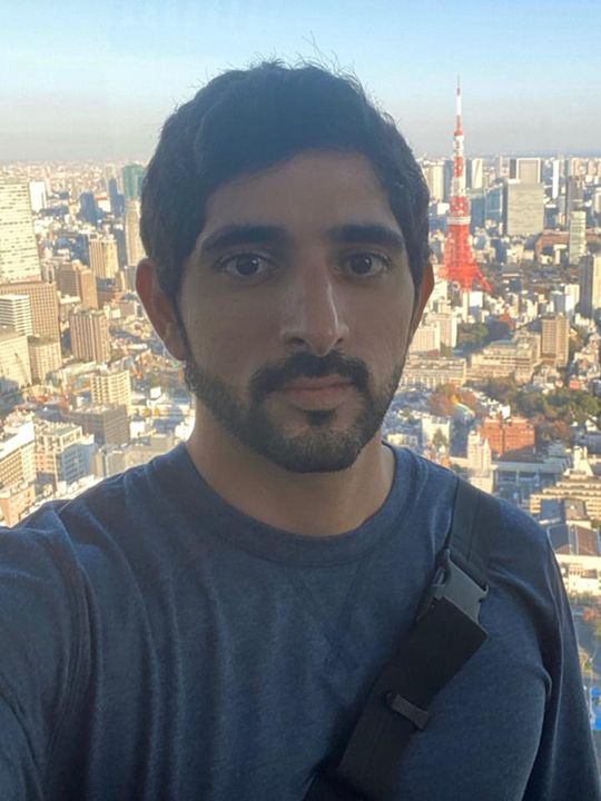 Sheikh Hamdan taking a selfie with Tokyo Tower behind him during his trip to Tokyo. ( Instagram : @faz3)