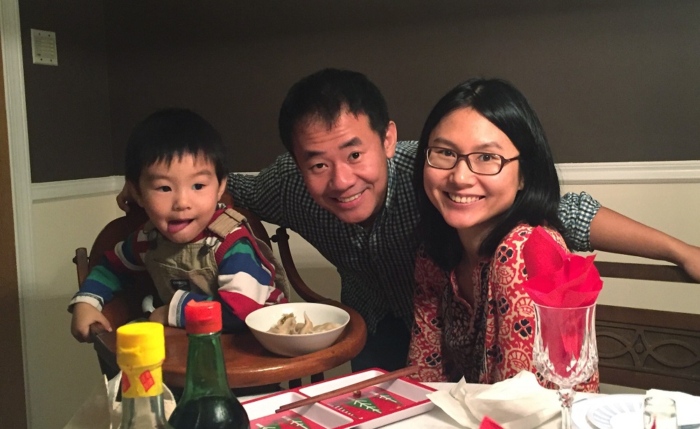 This undated photo released by Princeton University on December 7, 2019, and courtesy of Hua Qu, shows Princeton graduate student Xiyue Wang (C) with his wife and their son before he was detained in Iran in August 2016.