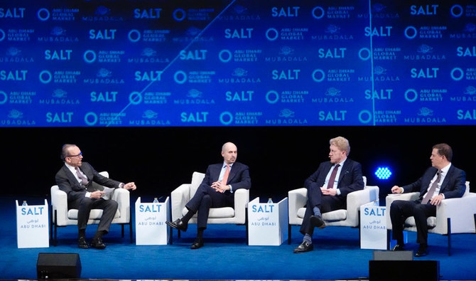 Taking part in a panel discussion on the second day of the SALT conference in Abu Dhabi from left to right: Majid Jafar, Crescent Petroleum’s CEO, R. J. Johnston, executive adviser and managing director for global energy and natural resources at Eurasia Group Francisco Blanch, global head of commodities research at Bank of America Merrill Lynch. (AN Photo/Huda Bashatah)