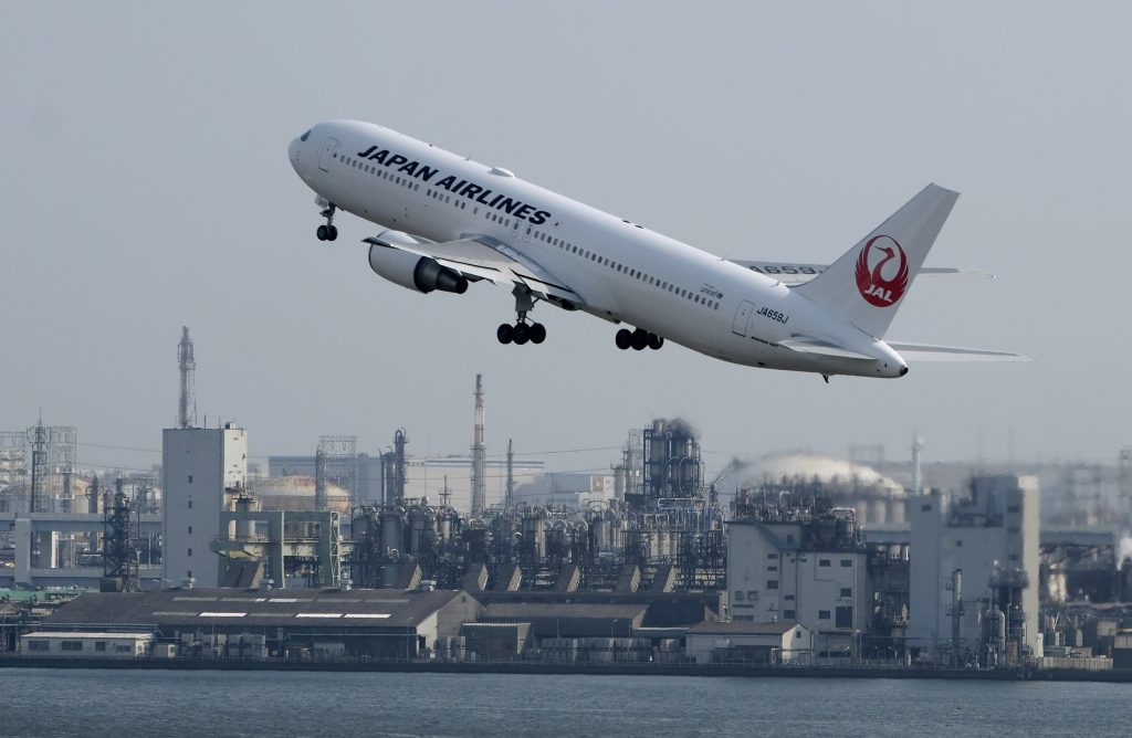 A Japan Airlines (JAL) passenger jet takes off from Haneda Airport in Tokyo on July 31, 2019. (AFP)