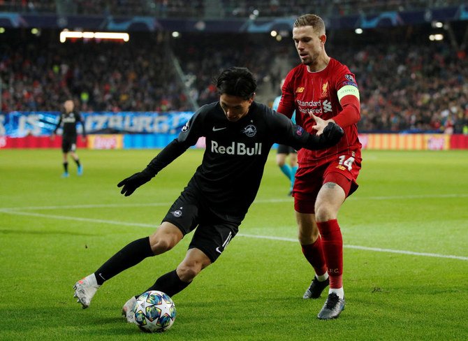 The Premier League leaders announced the signing of the 24-year-old Minamino on Thursday, saying he will officially join on Jan. 1. (Reuters)