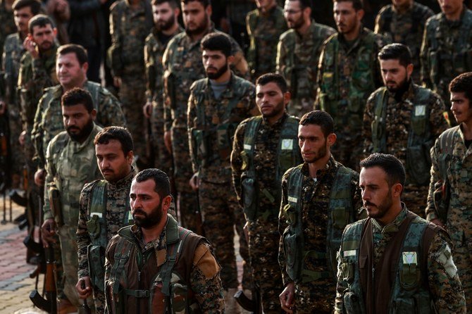 Syrian Kurdish members of the People's Protection Units (YPG) in 2018. Turkey considers the group terrorists. (AFP/File photo)