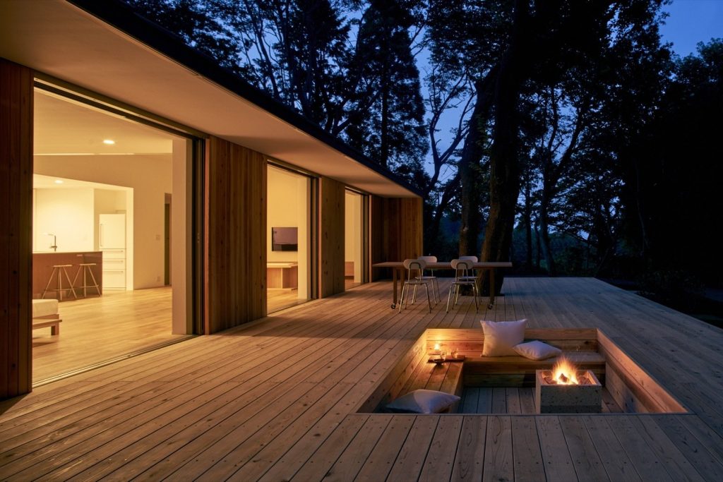 The wooden recessed area can serve as a fire pit or a garden. (Photo courtesy: MUJI)