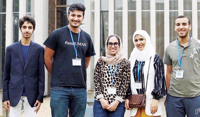 Saudi peace activist Naif Al-Harbi, second left, at the Emerging Peacemakers event at Cambridge University. Al-Harbi took to social media to recruit people to his cause. (Photos/Supplied)