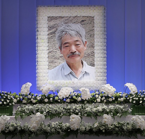 The late Tetsu Nakamura was honored with the Order of the Rising Sun, Gold Rays with Rosette. (AFP/file)