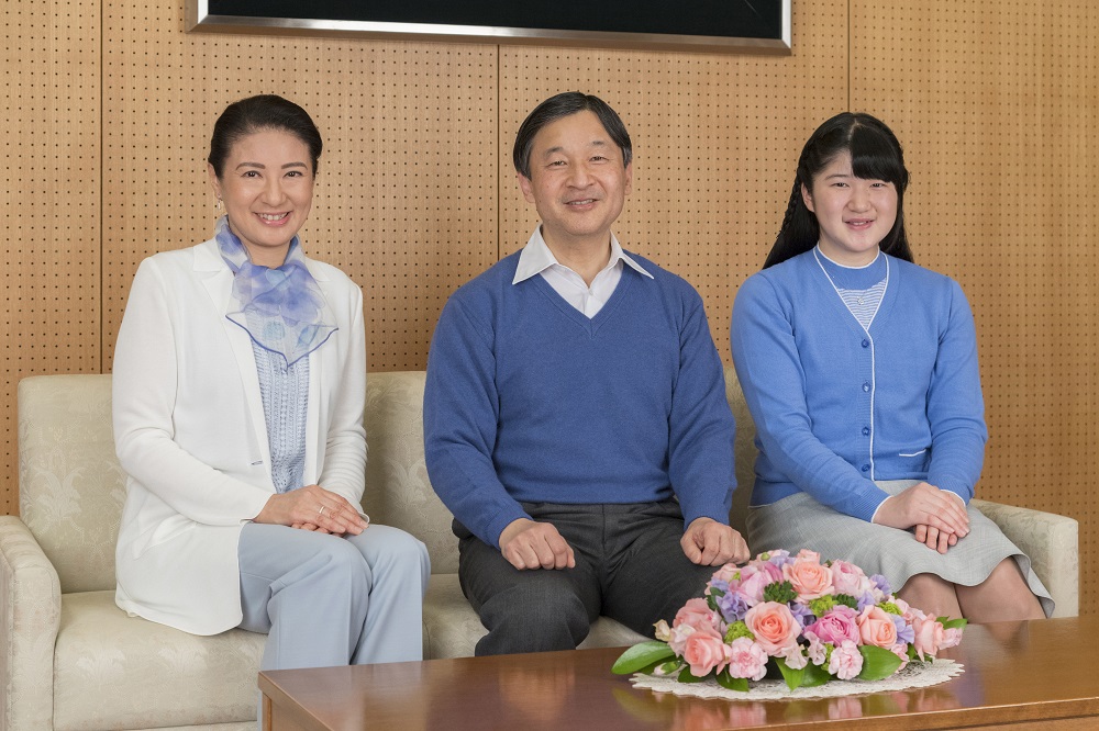 This handout photo taken on February 12, 2018 and released by the Imperial Household Agency of Japan on February 22 shows Japan's Crown Prince Naruhito (C) posing for a photograph with Crown Princess Masako (L) and Princess Aiko (R) at the Togu Palace in Tokyo. (AFP/file)